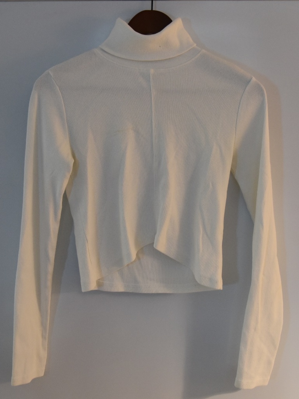 White Ribbed and Cropped Turtleneck with Asymmetrical Hem